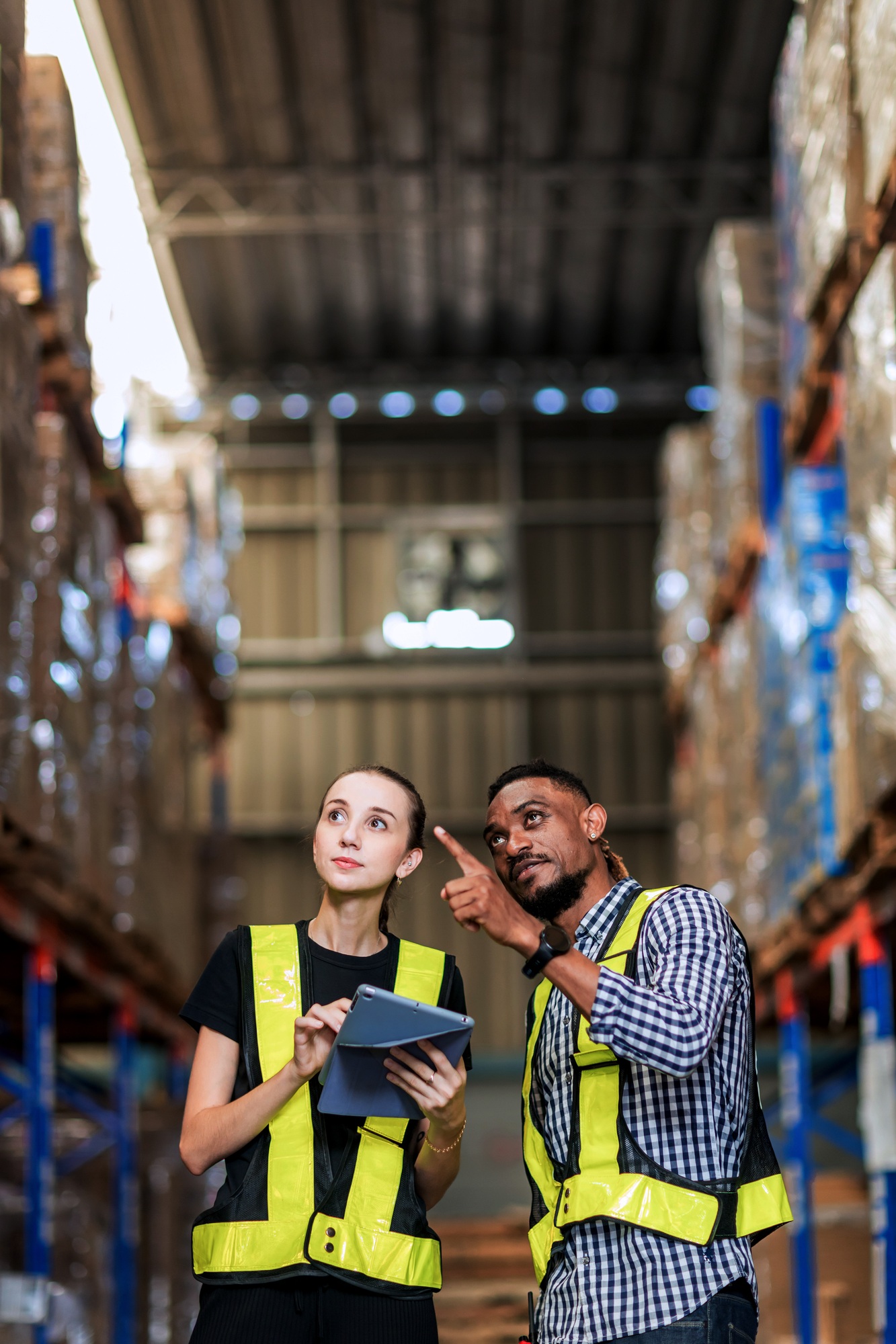 Warehouse worker working in warehouse storage.
